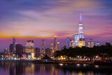 Fototapeta  - New York City Manhattan downtown skyline at dusk with skyscrapers over Hudson River,