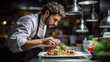 © PaulShlykov - Cook man neatly decorates the dish. young professional chef adding some piquancy to meal. in modern kitchen, at work in uniform