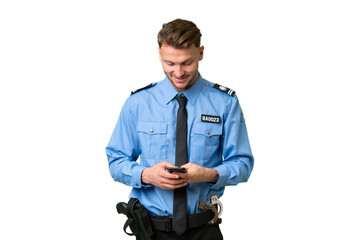 Sticker - Young police man over isolated background sending a message with the mobile