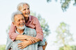 © Lumos sp - woman man outdoor senior couple happy lifestyle retirement together smiling love fun elderly active vitality nature mature portrait piggyback game