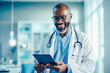 © ADDICTIVE STOCK - African american male doctor with eyeglasses smiling looking at digital tablet in the hospital. Generative AI.