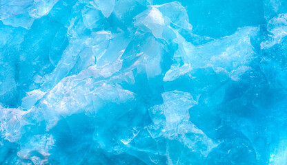 a close-up of the layered surface of a blue glacier (iceberg) - knud rasmussen glacier near kulusuk 