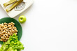 © 279photo - White floor weight scales with greenery and healthy food. Diet and body weight control concept