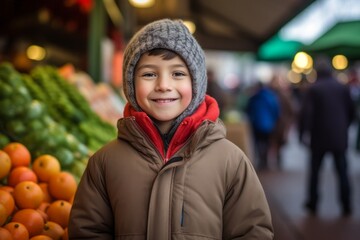Wall Mural - Studio portrait photography of a happy kid male wearing a cozy winter coat against a bustling farmer's market background. With generative AI technology