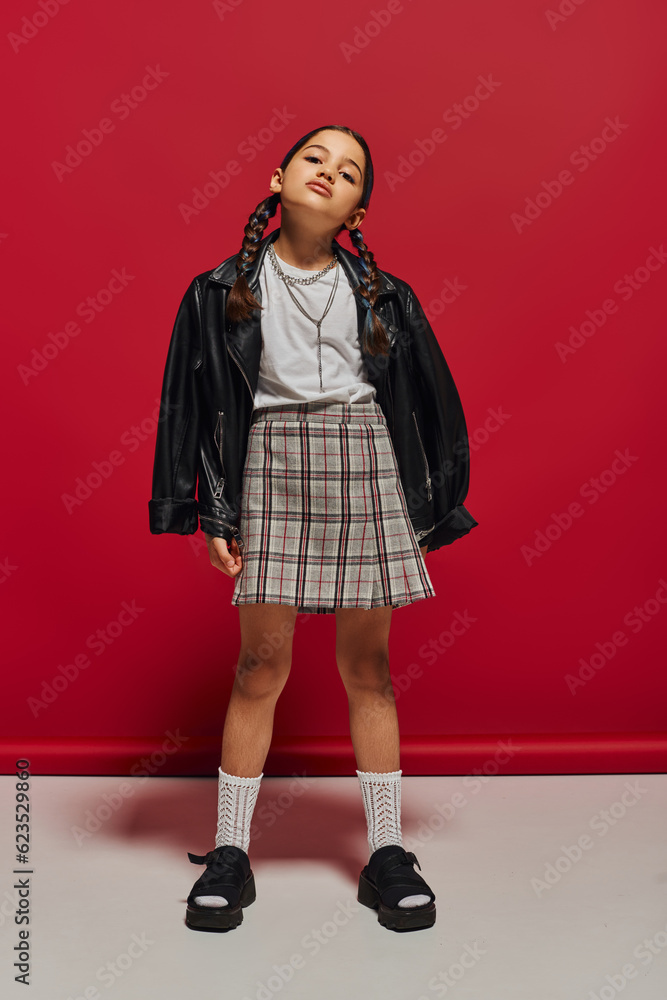 full-length-of-confident-and-fashionable-preteen-girl-with-hairstyle
