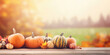 Festive autumn decor from pumpkins, corns and fall leaves. Concept of Thanksgiving day or Halloween

