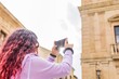 © Sangiao_Photography - Smartphone technology holiday vacation. Latin American mid-female. Lifestyle photo in Salamanca.