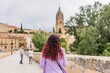 © Sangiao_Photography - Unrecognizable female back view travel vacation, explore city of Spain. Salamanca tourist
