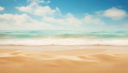 Beautiful tropical beach with sand and wave on blue sky background.