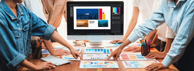 Aufkleber - Graphic designer brainstorming logo and graphic art at busy artistic workshop, laptop display workspace. Experimenting color palette and pattern for creative design. Panorama shot. Scrutinize
