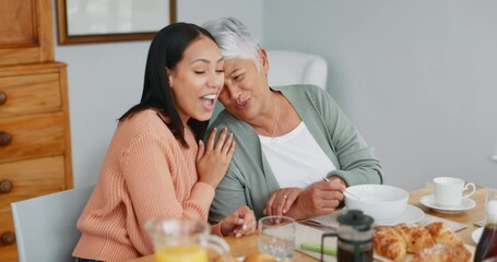 Wall Mural - Senior mom, woman and breakfast at table, hug and chat with nutrition, comic joke and bonding in morning. Happy family house, mother and daughter with conversation, love and diet with smile together