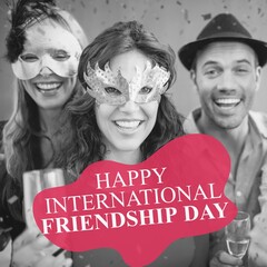 Sticker - Happy international friendship day text on red over happy caucasian friends drinking at party