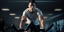Portrait Of A Young Athletic Man In Sportswear Doing Cycling On Exercise Bikes At The Gym, Generative Ai