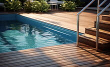 Swimming Pool With Stair And Wooden Deck At Hotel.