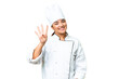 © luismolinero - Young woman Chef over isolated chroma key background happy and counting four with fingers
