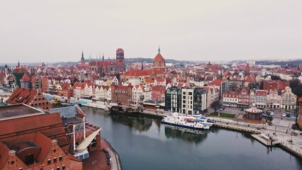 Wall Mural - Gdansk city in Poland with view on Motlava river. Historical center in old town in european city, aerial view. Panoramic skyline of modern european city