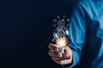 Leinwandbilder - Hand Business with rocket launch icon, Fast start up business to goal and success objective target and solution concept...