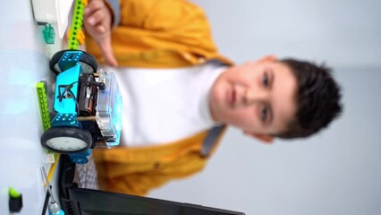 Wall Mural - robotics programming class. children construct mbot and code robot. stem education using constructor