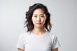 © Robert MEYNER - Portrait of a young asian woman in white t-shirt