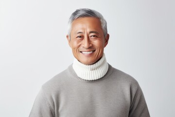 Sticker - Portrait of smiling asian senior man in sweater looking at camera