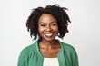 © Robert MEYNER - Portrait of young african american woman smiling against white background