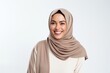 © Robert MEYNER - Portrait of a smiling muslim woman in hijab isolated on a white background