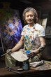 © View Stock - Studio senior painter of painting