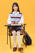 © View Stock - Youthful energetic and confident female college student