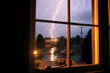 © Russell - View from outside a window at night, showcasing the raw power and electrifying beauty of a thunderstorm in full force (Generative AI)