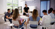 © Andrey Popov - Teaching Massage Class To Group