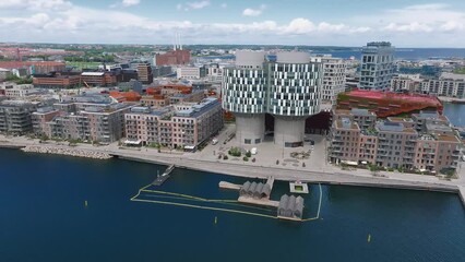 Wall Mural - Aerial panorama of Indre Osterbro, Nordhavnen districts. New modern district in Copenhagen, Denmark. Beautiful modern buildings, Portland Towers and UN.