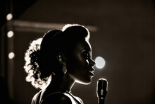 A Beautiful Black Woman, Jazz Singer, On Stage, With A Gesture Of Emotional Intensity.
