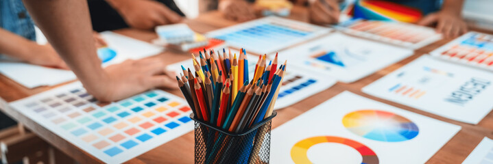 Aufkleber - Graphic designer brainstorm logo and graphic art at busy creative studio workshop. Experiment and brainstorm color palette and pattern at workspace table for creative design. Panorama shot. Scrutinize