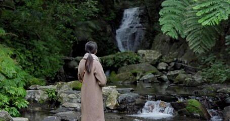 Sticker - Tourist woman go Wufengqi Waterfall in Yilan of Taiwan