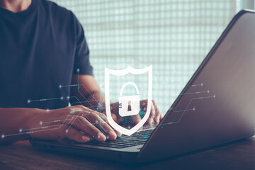 Cybersecurity concept. Businessman press enters button on the keyboard computer with Shield cyber Key lock security system abstract technology world digital link cyber security.