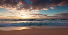 Ocean Beach Sunrise With Color Sky Clouds And Sun Rays Over Sea Waves 4K Video