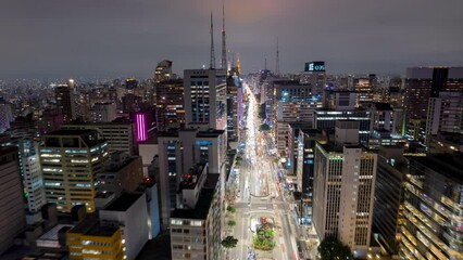 Wall Mural - Aerial view of Av. Paulista in Sao Paulo, SP. Main avenue of the capital. Photo at night, with car lights.