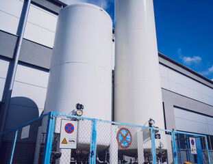 Liquid nitrogen tanks and heat exchanger coils for producing industrial gas