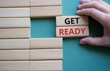 Wall Mural - get ready symbol. wooden blocks with words get ready. beautiful grey green background. businessman h