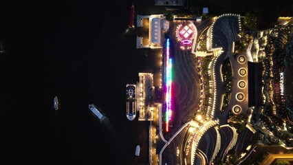 Wall Mural - Aerial view of Icon Siam mall by night on the chao phraya river in khlong san, bangkok, Thailand