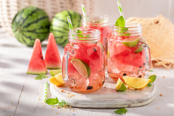 Wall Mural - Healthy lemonade made of lime and watermelons.