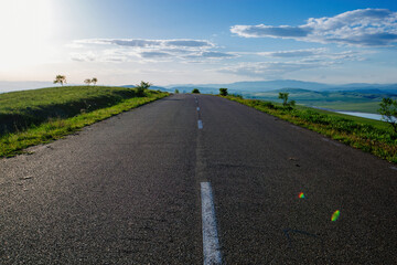 Mountain road at summer day