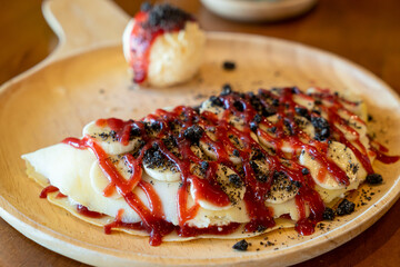 Poster - crepe with banana, whipped cream and strawberry sauce