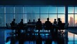 © Rumi X - Business People in a Board Room Meeting Early Morning Silhoutte