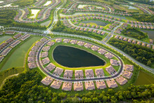 View From Above Of Densely Built Residential Houses Near Retention Ponds In Closed Living Clubs In South Florida. American Dream Homes As Example Of Real Estate Development In US Suburbs