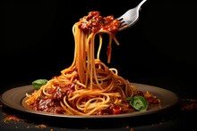 Appetizing Spaghetti Rolled On Fork With Typical Italian Sauce