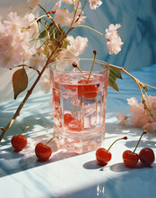 The Vibrant Colors Of The Cherries And Blossoms Bursting Forth In A Glistening Glass Of Refreshment Evoke Feelings Of Joy And Renewal