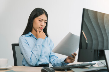 Wall Mural - stress asian woman while coding data programmer on desktop pc while working on computer codes in the