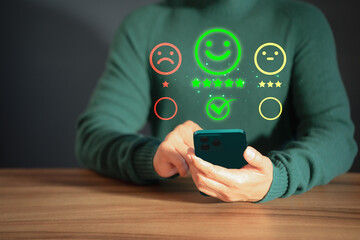 Poster - Client hands using a mobile phone with pop up smile face icon for feedback review satisfaction service opinion and testimonial. Customer service experience assessment and business satisfaction survey