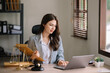 © Nuttapong punna - Beautiful asian woman lawyer working and gavel, tablet, laptop in front, Advice justice and law concept..